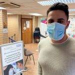 Pharmacist Salwan wearing a mask indoors